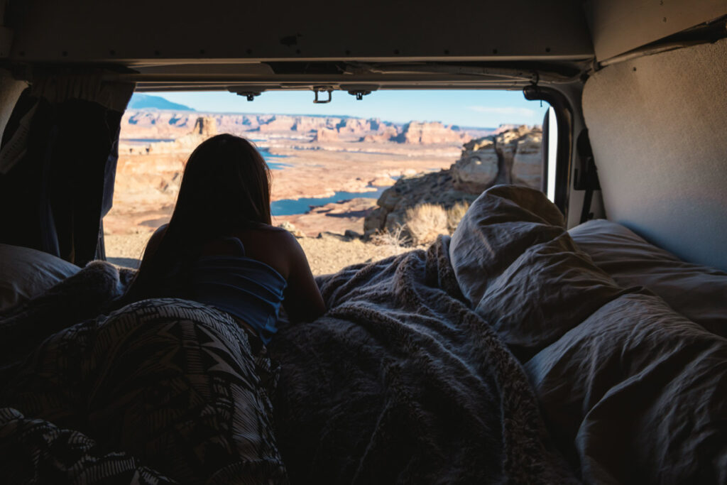 Girl in camper van on a southwest road trip of a lifetime