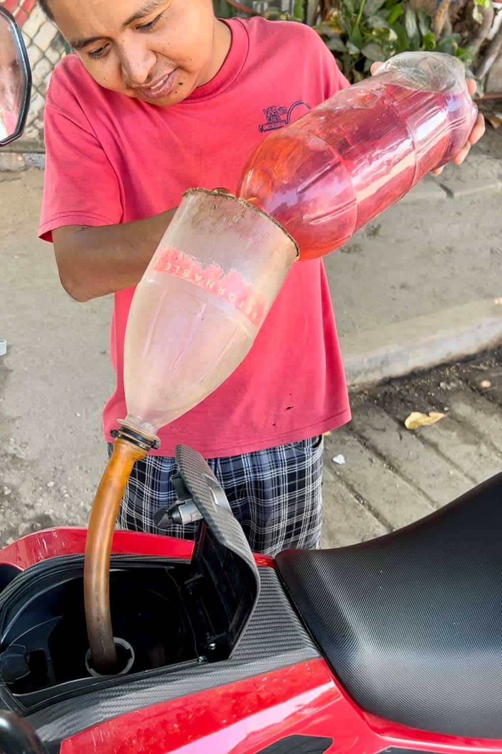 Siphoning gas into a scooter