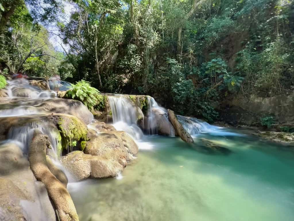 blue pools of water of the cascadas magicas de copalitilla waterfall
