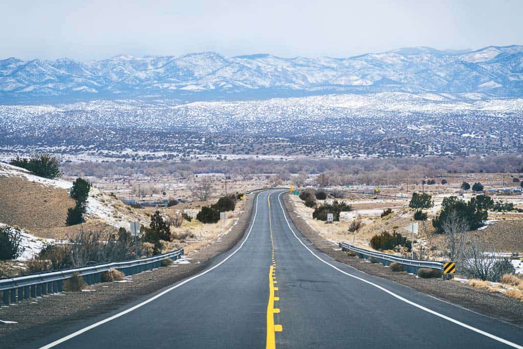 Northern New mexico open road with snow