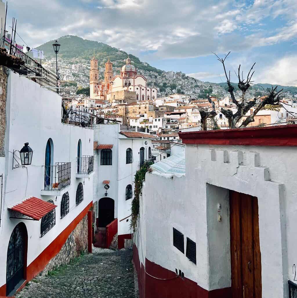 Sunlit church of the winding streets of Taxco