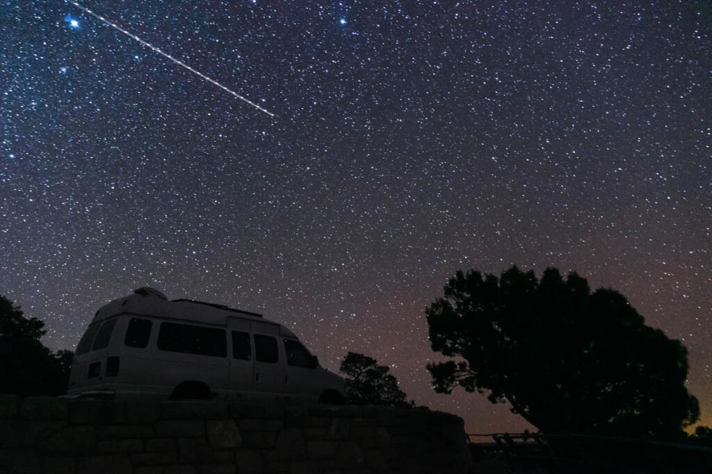 Camper Van in a Starry Sky in Grand Canyon on a northern arizona road trip