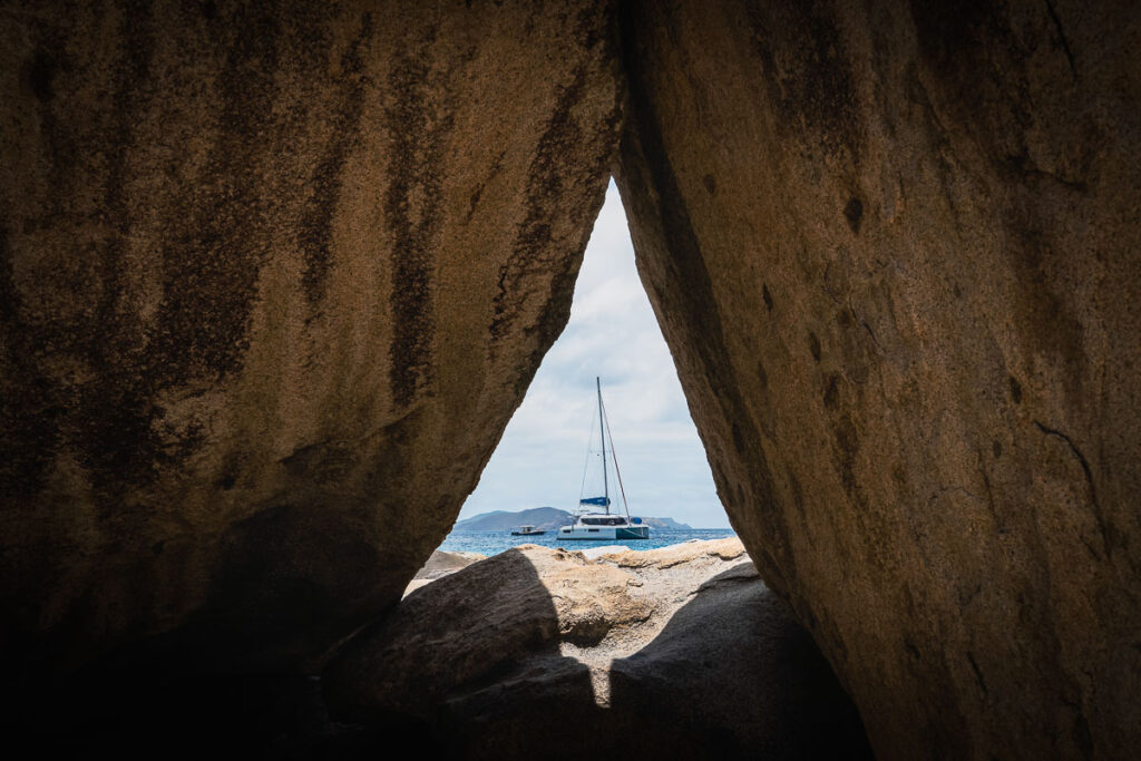 sailboat framed in boulder