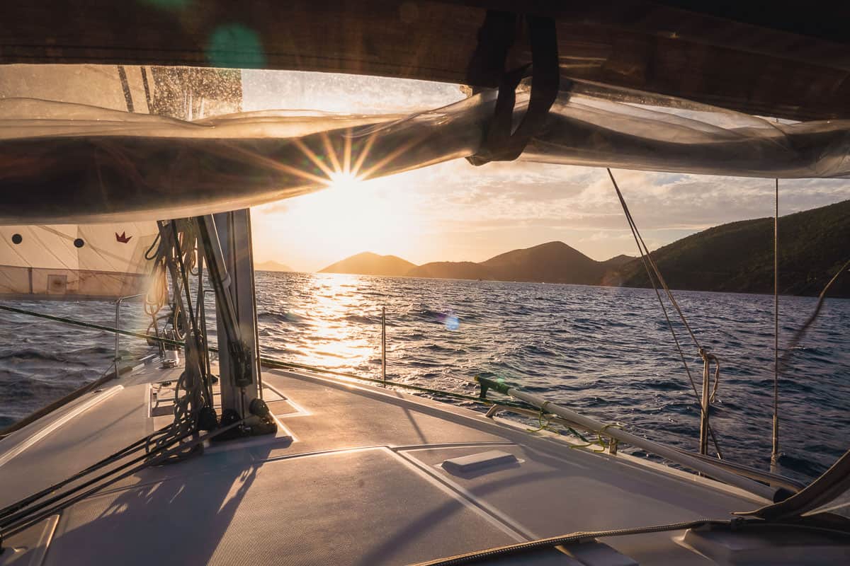 sunset on sailboat