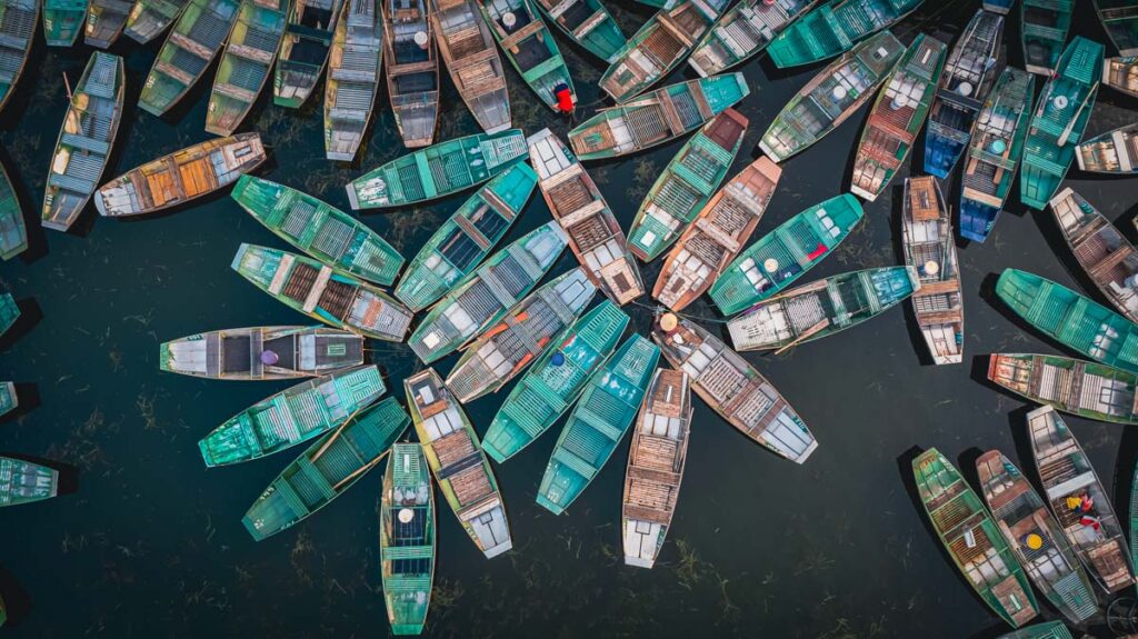 colorful boats arranged in a flower shape