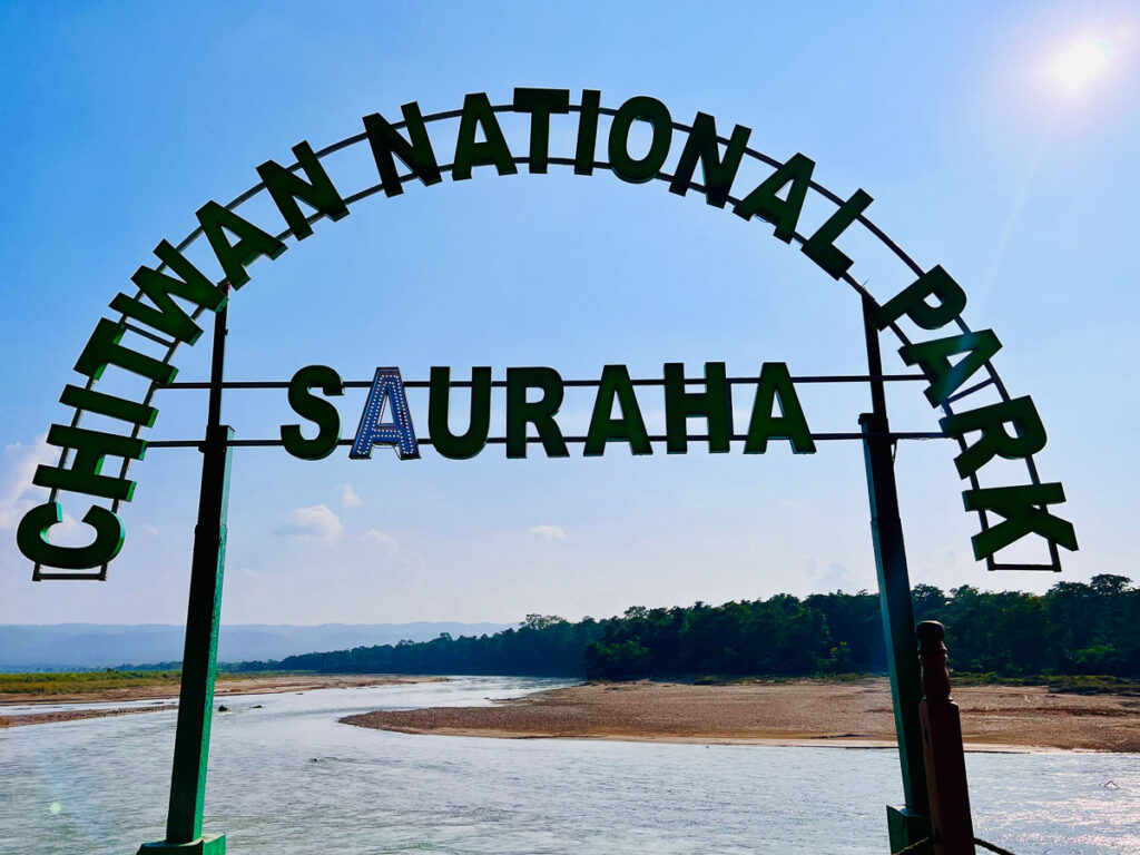 chitwan national park sign on the riverwalk