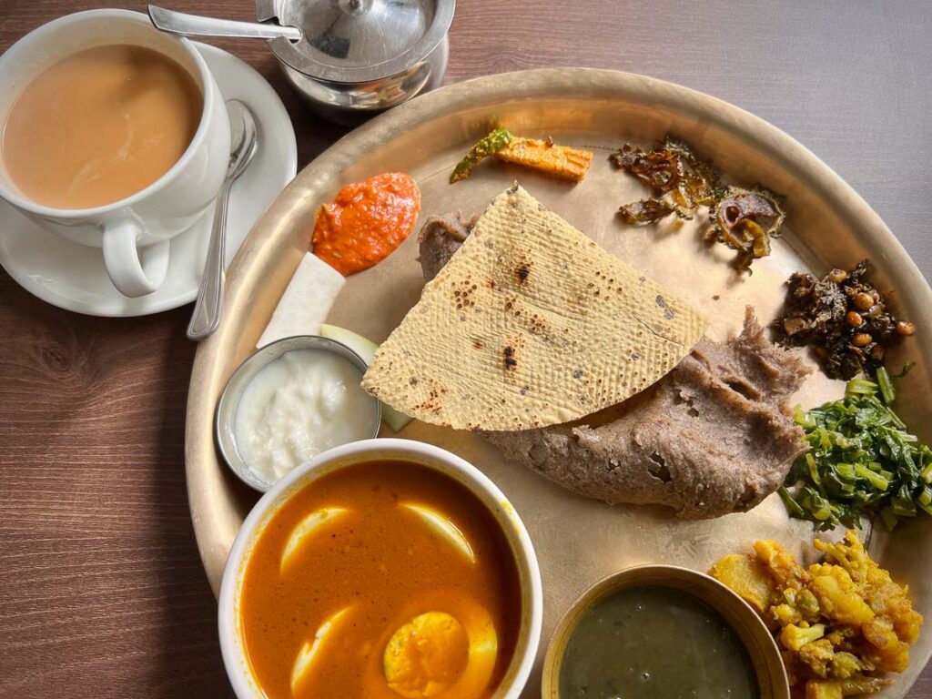 Thali and milk tea, enjoy the delicious food flavors of nepal