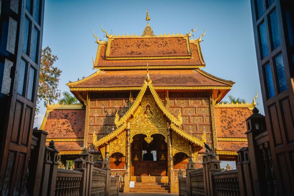 a golden temple from chiang saen thailand
