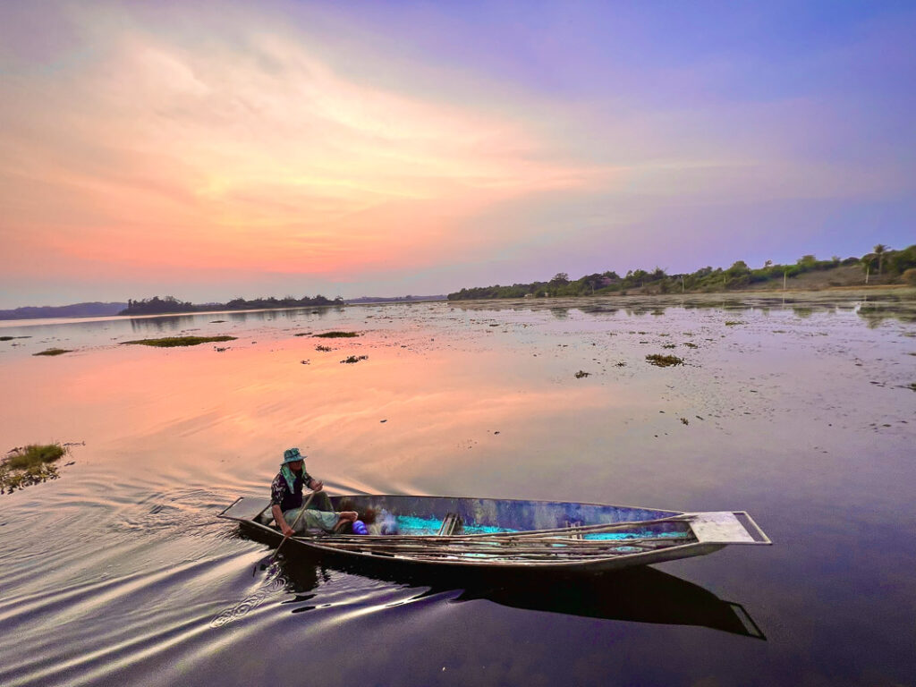 sunset fisherman on the chiang saen lake
