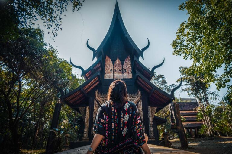 Cat Xu in front of temple of Baan Dam Museum