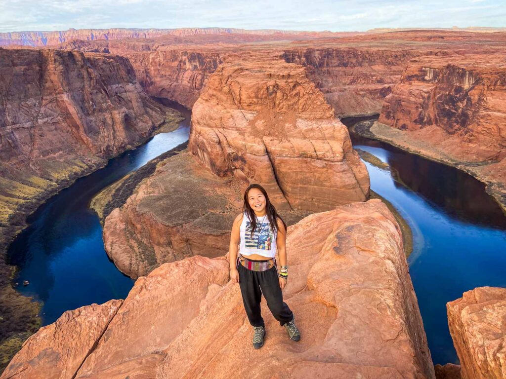 Nomadicated standing at the edge of Horseshoe Bend