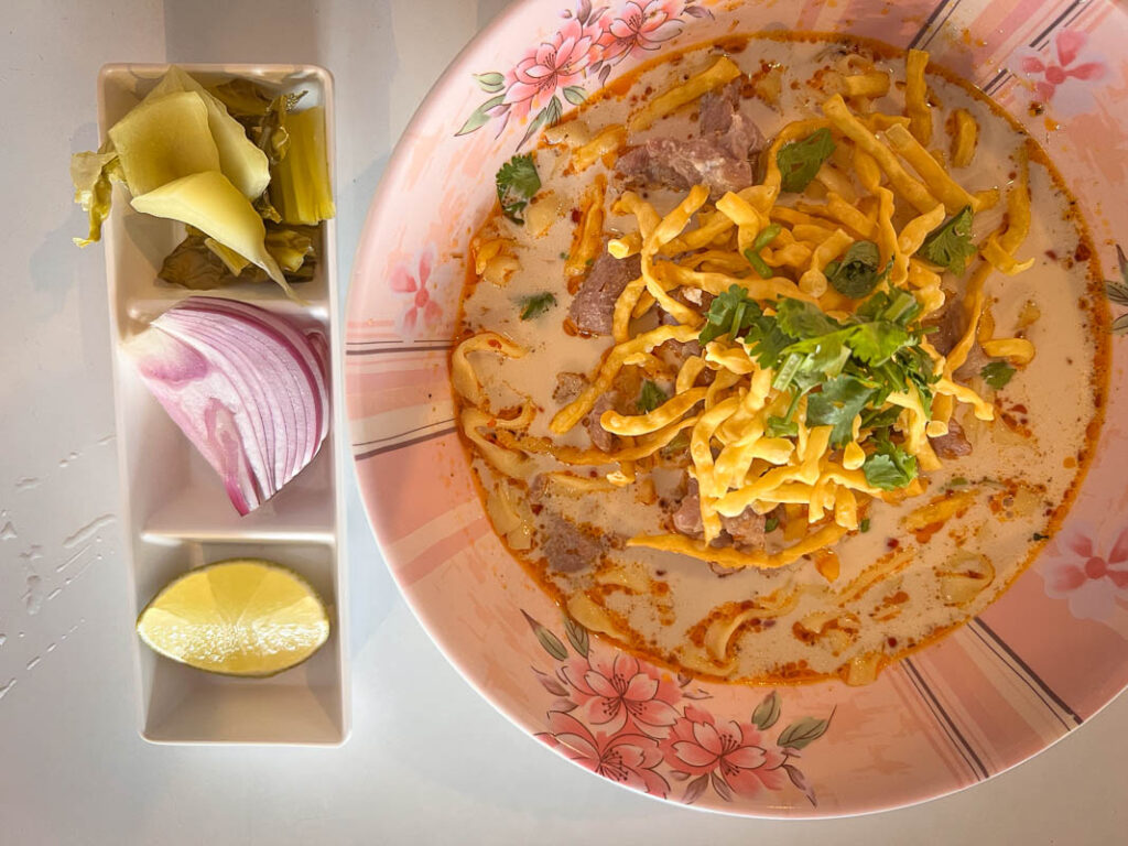 khao soi, a unique northern thailand dish to cook in a chiang mai cooking class