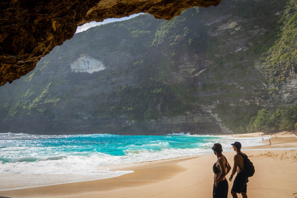 teo silhouettes under t-rex Beach's hidden coves with ocean views