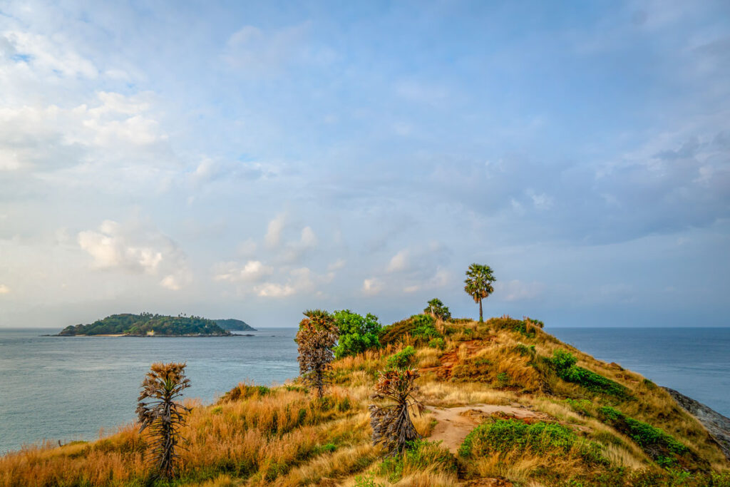 Promthep Cape's panoramic ocean view and lighthouse at sunrise. You can go anywhere when you rent a motorbike in phuket