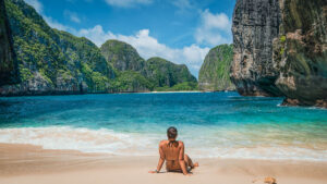 nomadicated lounging in front of maya bay on a sunny day