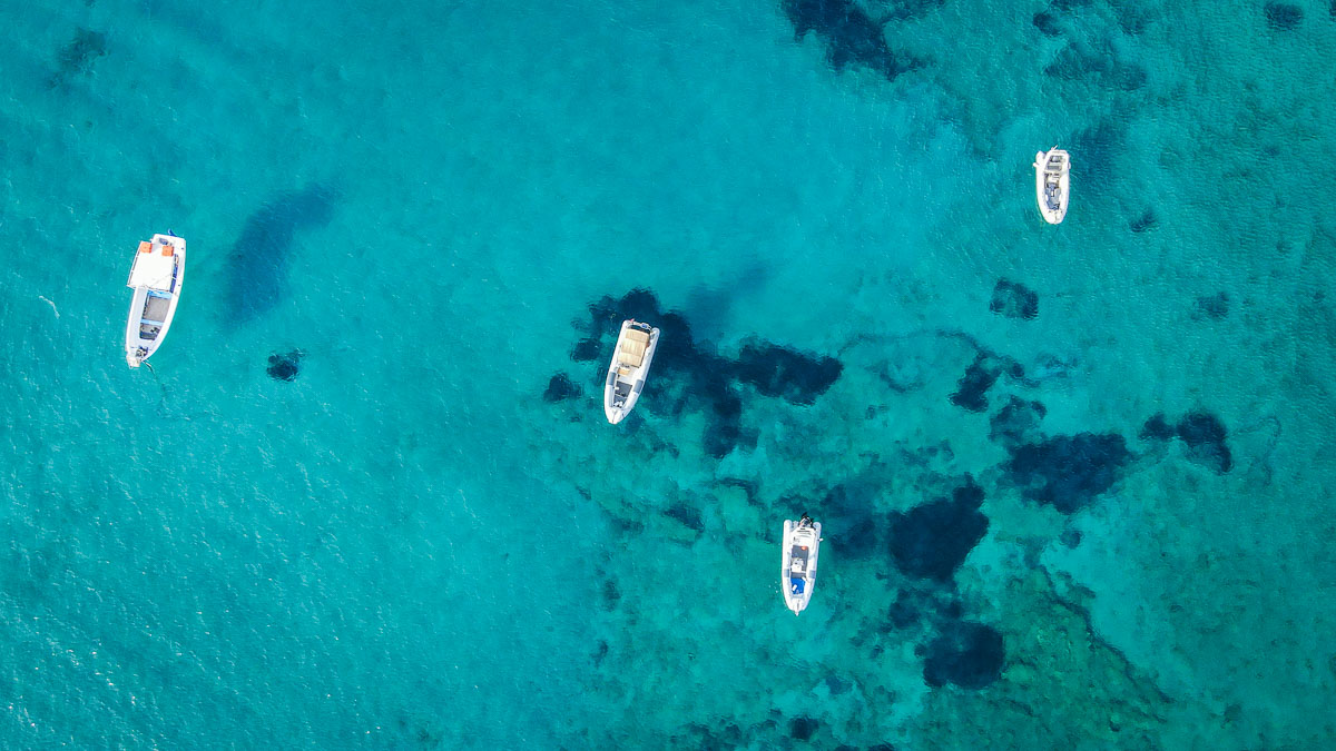 yachts floating on the clear seas in greece