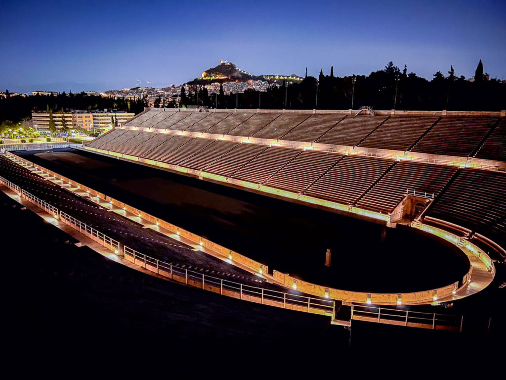 full view of the Panathenaic Stadium at night, one of athens historical sites