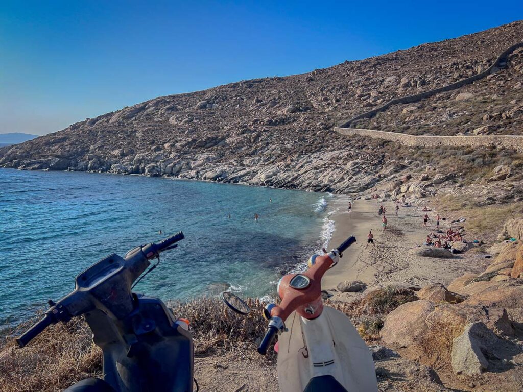 renting a scooter in mykonos to go to local unorganized beaches which is less expensive