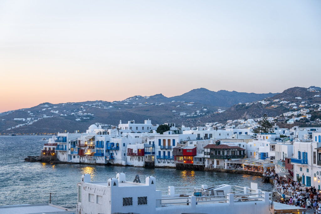 white roofs of mykonos city in sunset