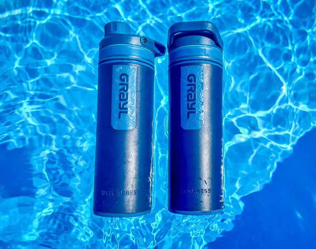 two grayl water purifiers in a swimming pool