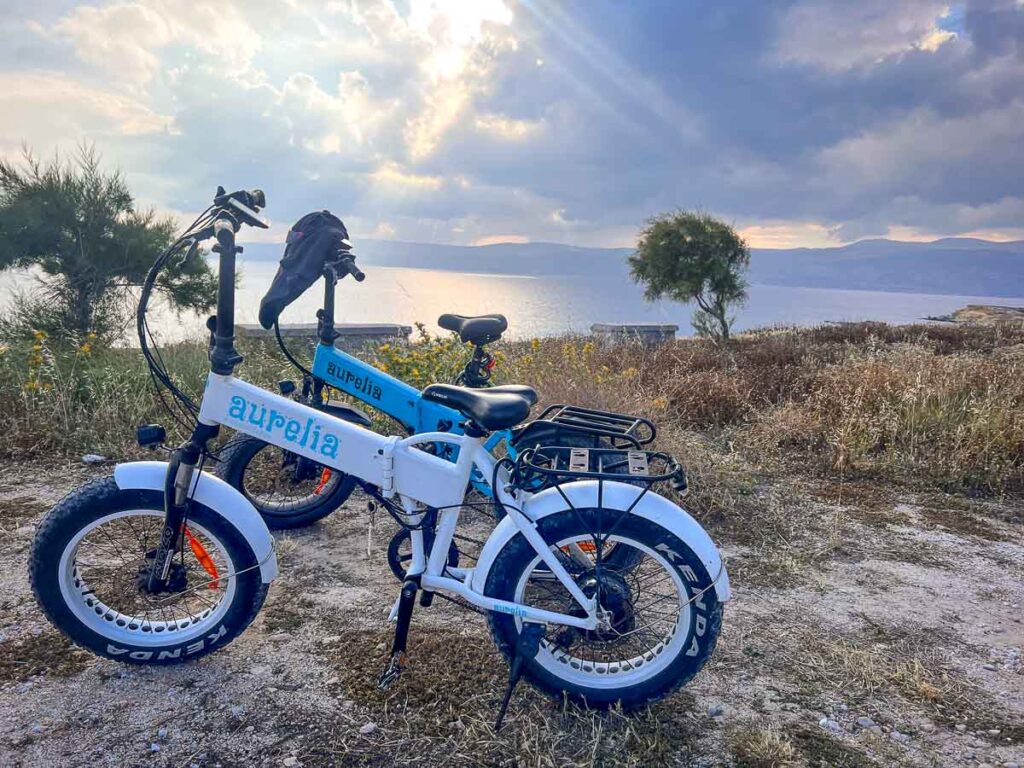 ebikes on the cliffs of Koufonisia island during the sunset