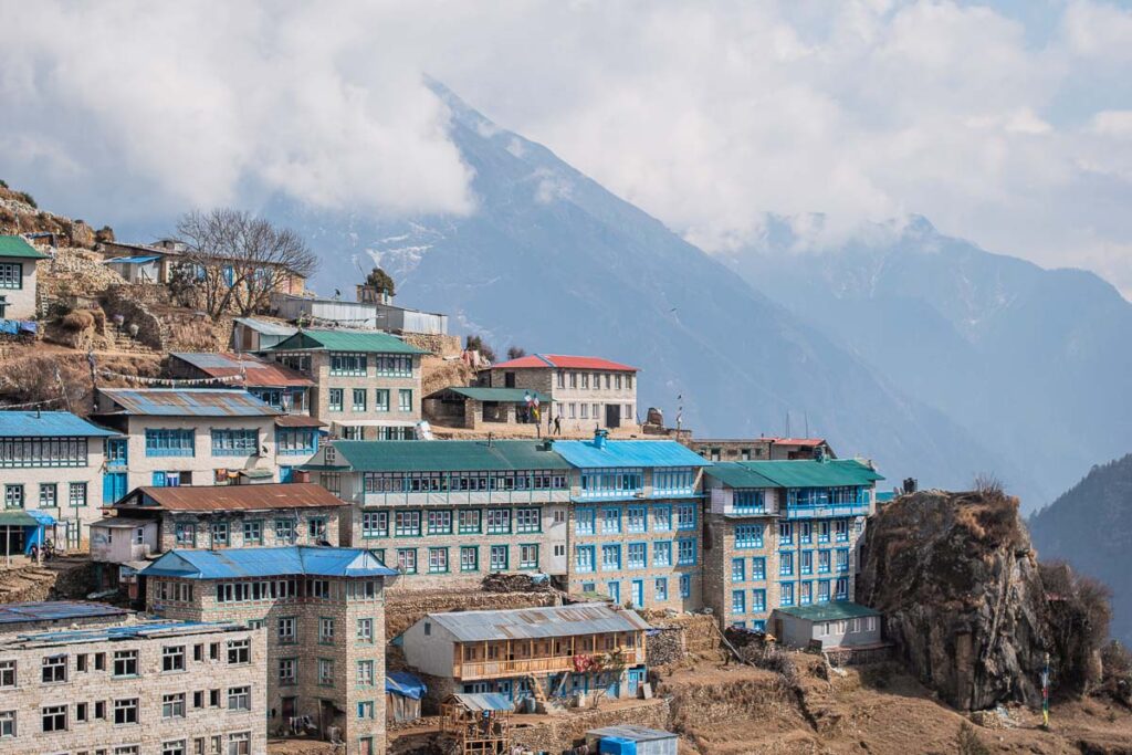 Traditional Sherpa Village Nestled in Eastern Nepal with mountain backdrop
