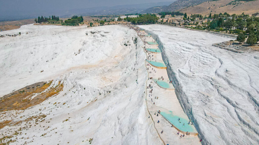 The iconic travertine terraces of Pamukkale, resembling a cascading staircase