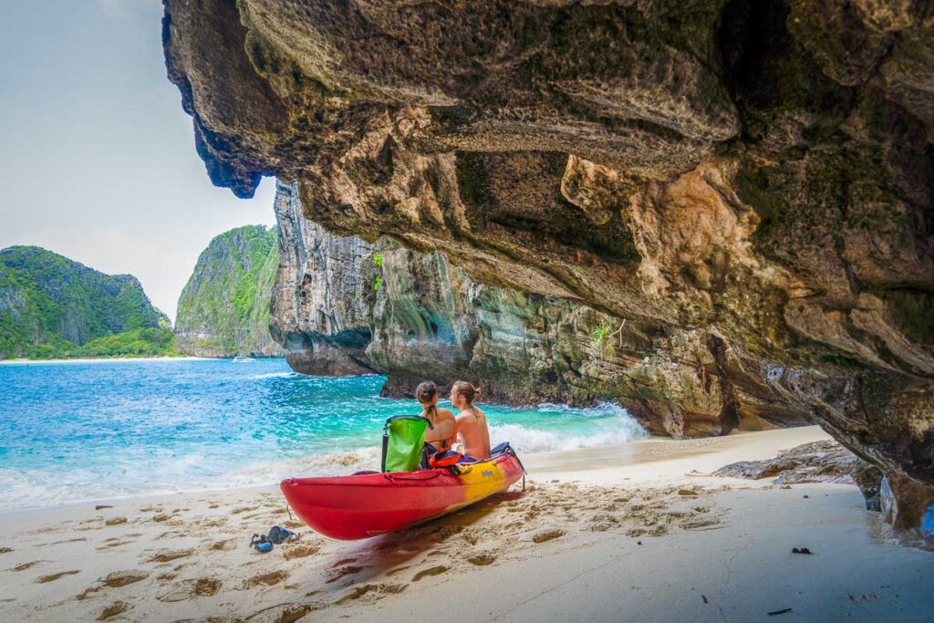 Nomadicated and friend touring phi phi island with a kayak