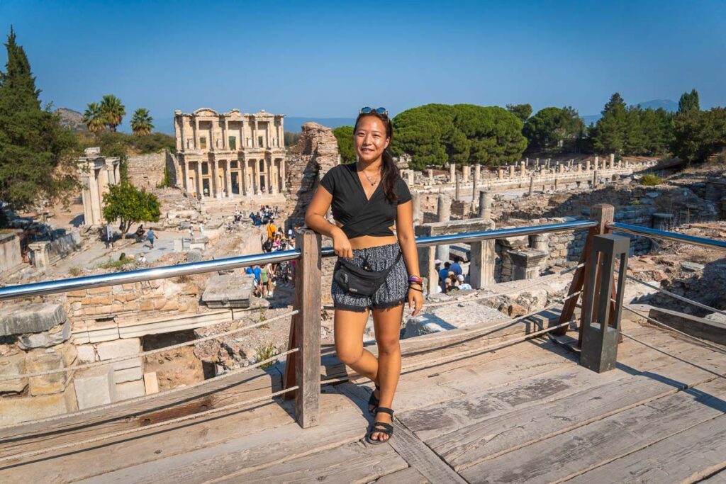 nomadicated posing in front of A stunning view of the library of ephesus