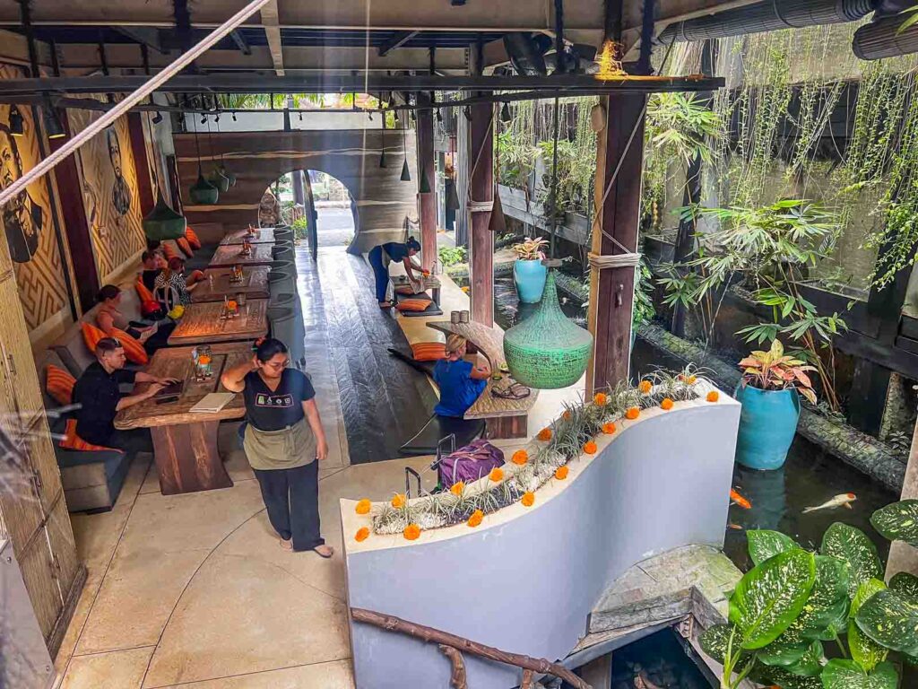 the beautiful interior of clear cafe in ubud