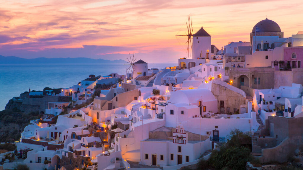 Greece, Santorini Lights of Oia village at night