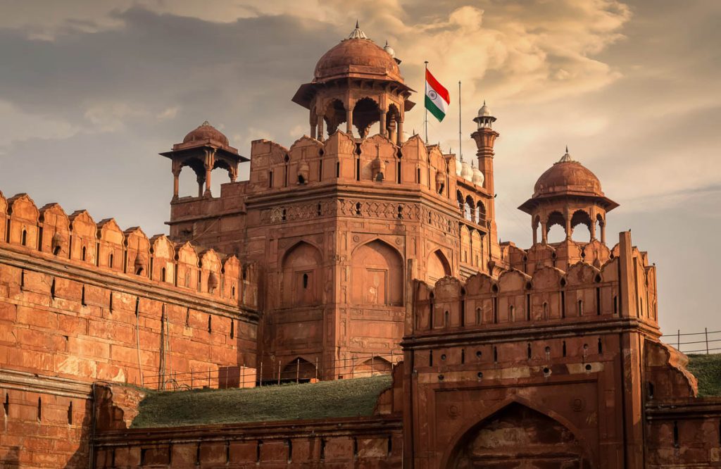 India, Delhi, historic Red Fort built of red sandstone with Mughal domes and ramparts