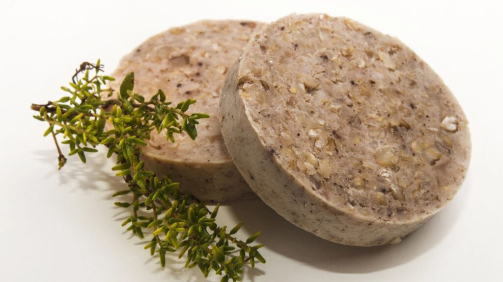 Food, Raw Irish white pudding with oatmeal on bright with thyme