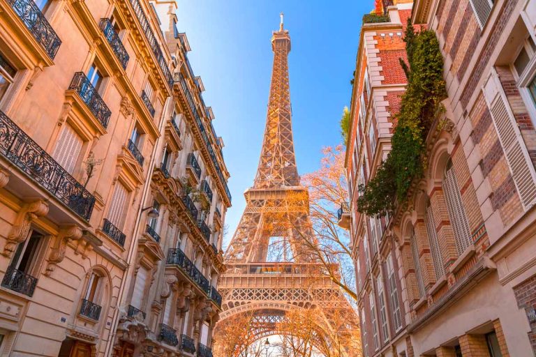 Paris, France - JAN 24, 2022: The iconic Eiffel Tower, wrought-iron lattice tower designed by Gustave Eiffel on the Champ de Mars in Paris, France.