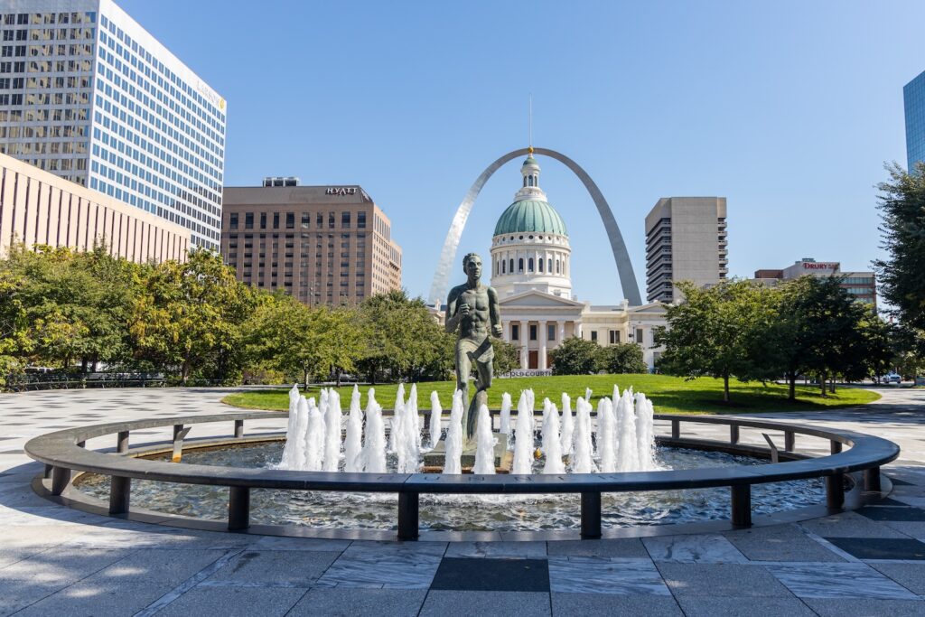 ST. LOUIS, MISSOURI USA - OCTOBER 5, 2024: The Kiener Memorial Fountain and Statue entitled "The Runner" in front of the Old St. Louis Courthouse.