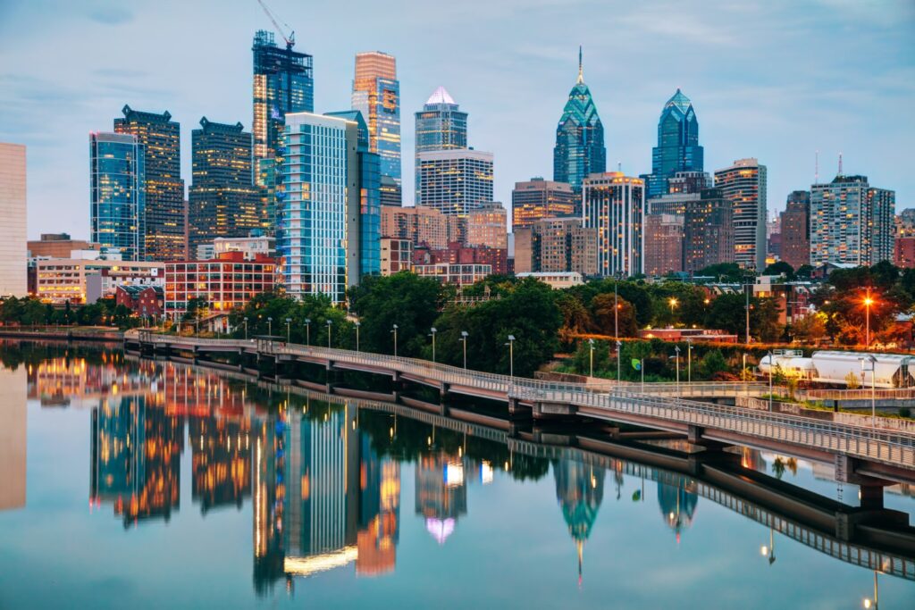 Philadelphia skyline at night with the Schuylkill river