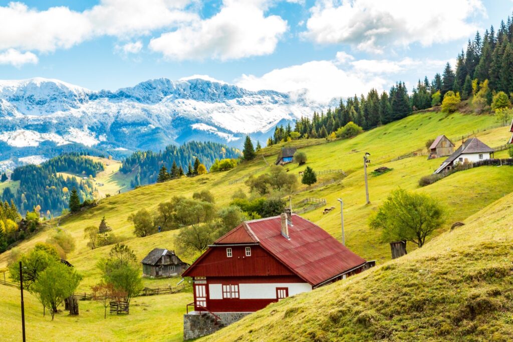 Europe, Romania, Transylvania, Carpathian Mountains. Hill sides, hiking trails, fields.