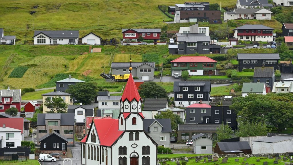 A coastal village on the south coast of the Faroe island of Vágar, Denmark