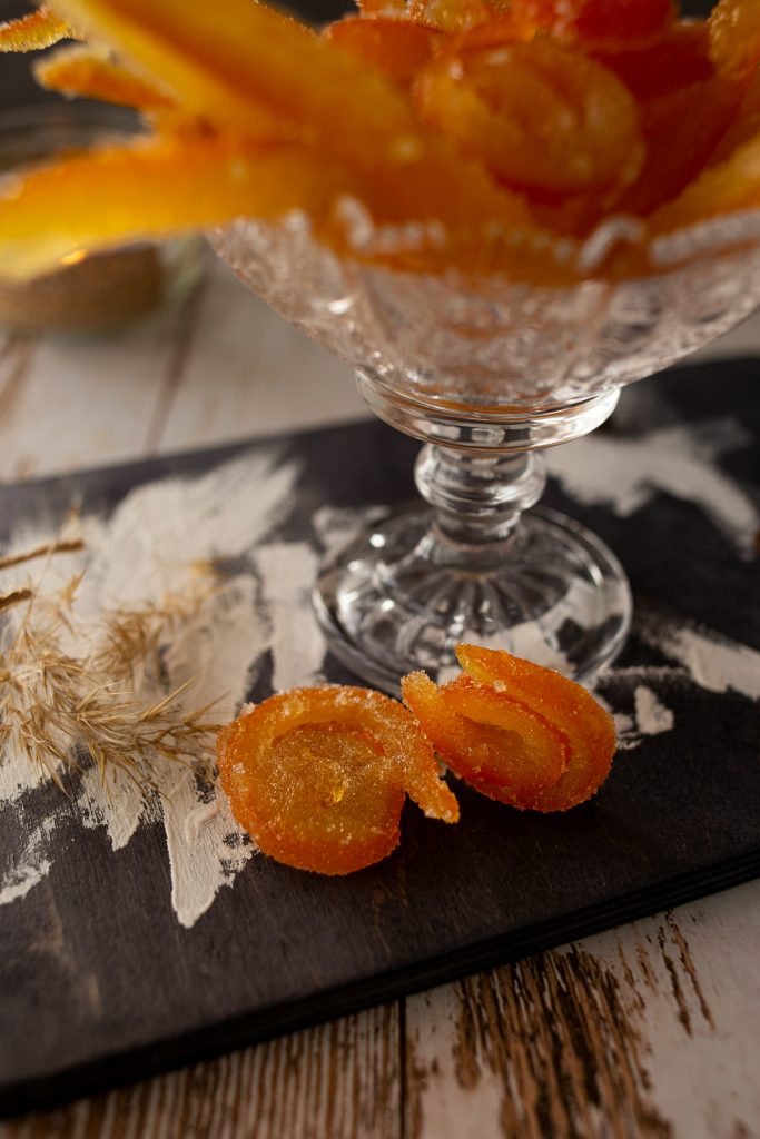orange fruit on clear glass bowl
